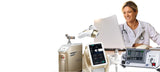 Medical professional using a laptop with medical equipments on a white background