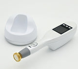 A handheld non-invasive plasma treatment device with a gold tip component lying on a surface. It is a great plasma device purchase.