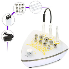 White electronic device with various attachments, it is a great microdermabrasion device purchase.
