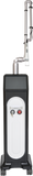 Portable device with a black and white design, featuring a red button and a clear tube.