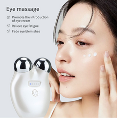 Eye massager with a woman using it on her face, promoting eye cream and relieving eye fatigue. It is a great EMS device purchase.