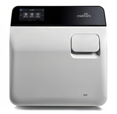 Silver medical device with black digital control top and 'midmark' branding.  It is an ideal value device purchase.