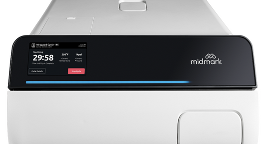 Midmark M9 Automatic Steam Sterilizer displaying a digital display and control panel on top.