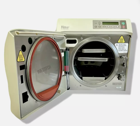 Ritter M9 Steam Sterilizer with the door open, displaying the interior chamber and digital control panel on top. It is an ideal value purchase device.